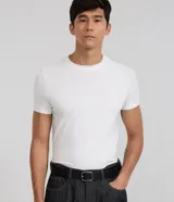 Remera Marfinno de manga corta y cuello redondo, modelo muscle fit de color blanco con textura de piqué.