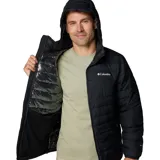 Campera acolchada negra con capucha, cierre frontal completo y bolsillos laterales con cremallera. Presenta tecnología termorreflectante en el interior y logo de la marca estampado en el pecho.