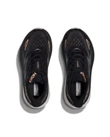 Championes de running Hoka Clifton 9, color negro con detalles en bronce y suela blanca.