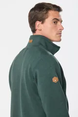 Campera gris jaspeado con cierre frontal, cuello alto y bolsillos laterales. Interior de polar.