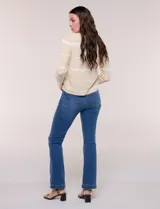 Cardigan de punto fino Elie Tahari con diseño a rayas horizontales en color negro y blanco, escote redondo, cierre frontal de botones y mangas largas.