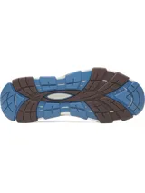 Championes de entrenamiento Under Armour Halo Trainer, con diseño híbrido de perfil bajo. Presentan una parte superior ligera con perforaciones para ventilación, amortiguación reactiva UA HOVR para retorno de energía, estabilizador de tobillo y contrafuerte externo en el talón. Suela de goma con ranuras de flexión para tracción en múltiples superficies.