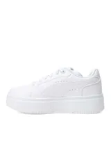 Championes Puma modelo Rebound Femme Low, color blanco, con diseño de plataforma y detalles perforados en la puntera y los laterales.
