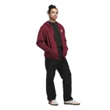 Campera Adidas Shmoo G Hood color bordó con cierre frontal, capucha con cordones ajustables, bolsillos tipo canguro y logo de Adidas bordado en blanco en el pecho.