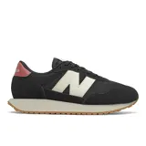 Championes New Balance 237 de dama, color negro con detalles en blanco y rojo. Capellada de malla y gamuza, entresuela de EVA y suela de goma.
