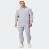Canguro deportivo con capucha color negro, confeccionado en tejido ligero y suave, de manga larga con puños elastizados y diseño de corte holgado.