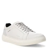 Zapatos casuales Freeway modelo Duo 02, color blanco, con cordones y suela ligeramente elevada. Presentan un diseño minimalista con detalles de costuras y logo de la marca en el lateral.