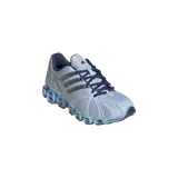 Championes Adidas Mega Ghostride Crystal Sky, color celeste con las icónicas tres tiras plateadas en los laterales y suela translúcida con amortiguación de cápsulas tubulares.