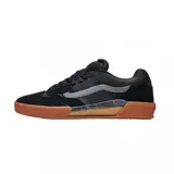 Championes Vans modelo Skate Ave 2.0, color negro con detalles en gris y suela de goma color caramelo. Diseño técnico con paneles de gamuza y malla, con la icónica banda lateral de la marca y tecnología de suela UltimateWaffle.