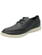 Zapato casual de cuero azul navy tipo náutico, con cordones y suela de goma blanca.
