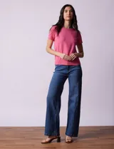 Buzo tejido en hilado fino color naranja, marca Ninety.