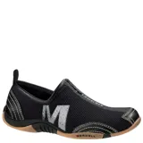 Championes de mujer Merrell modelo Barrado, color negro con suela de goma marrón y detalles en blanco. Diseño slip-on con cierre frontal y el logo de la marca en el lateral.
