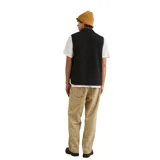 Chaleco de polar negro con cierre frontal, cuello alto y bolsillo en el pecho con cierre y solapa en contraste de color gris oscuro. Incluye logo de la marca bordado en el bolsillo.