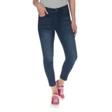 Jeans skinny de denim azul índigo con efecto lavado y roturas sutiles, de corte ajustado y tiro medio.