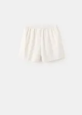 Short de algodón color beige, de corte sastrero con tiro alto y bolsillos laterales.
