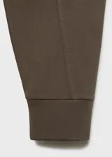 Buzo de cuello redondo y manga larga con diseño recto y holgado, confeccionado en tejido de viscosa con poliamida y elastano.
