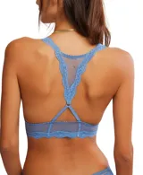 Bralette negro de malla transparente con ribete de encaje y espalda cruzada.