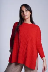 Sweater negro de punto con diseño de ochos, cuello redondo y mangas largas.