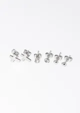 Set de tres pares de aros de acero quirúrgico hipoalergénico: un par con forma de cruz, un par con cristal y un par con esfera. Medida aproximada: 4-6mm.