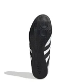 Championes Adidas modelo Tekwen, diseño sin cordones inspirado en el tenis, con capellada sintética blanca, las icónicas tres tiras laterales en negro y lengüeta de malla. Cuenta con entresuela de EVA para mayor amortiguación y suela de goma.