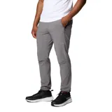 Pantalón técnico de senderismo color gris, con cintura elástica, bolsillos laterales con cierre y puños ajustables en los tobillos. Fabricado con tecnología Omni-Shade UPF 50 y Omni-Shield repelente al agua y manchas.