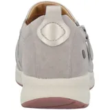 Zapatos slip on de gamuza en color gris, con suela blanca y detalle de cierre lateral funcional.