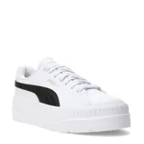 Championes Puma modelo Karmen Classic, color blanco con la franja lateral característica en negro. Presentan suela plataforma acanalada y diseño urbano.