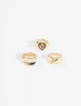 Set de anillos plateados con detalles de vidrio.