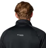 Campera polar Columbia Titanium modelo Triple Canyon G Ii, de color negro, con cuello alto, cierre frontal completo y bolsillos con cremallera. Cuenta con tecnología Omni-Wick para control de humedad, costuras planas y orificios para los pulgares en los puños.