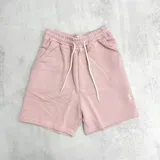 Short deportivo rosa de algodón con cintura elástica ajustable con cordón y bolsillos laterales.