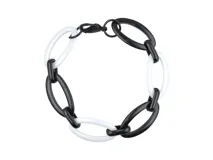 Pulsera de eslabones ovalados grandes intercalados en color blanco y negro, con cierre de mosquetón.