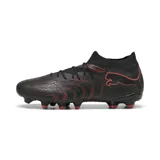 Championes de fútbol Puma Future 9 Match FG/AG, color negro con detalles en rojo/naranja. Presentan un diseño texturizado en el cuerpo y cuello tejido tipo calcetín.