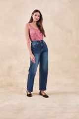 Top sin mangas de tejido de punto acanalado con acabado metalizado, de corte al cuerpo y escote redondo.