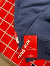 Hoodie azul marino de corte holgado con capucha amplia y estampado en la espalda con la palabra 'Ittab' en tipografía cursiva blanca.