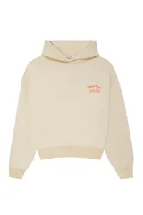 Canguro de color crema con capucha y estampado gráfico en color rojo en el pecho. Presenta mangas largas con puños elásticos y un diseño holgado.
