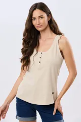 Musculosa azul marino con escote redondo y tirantes decorados con volados fruncidos.