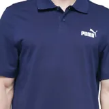Polo de hombre color negro, manga corta, con cuello y tapeta de dos botones. Presenta el logo Puma Cat en blanco en el pecho izquierdo.