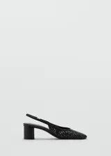 Zapato destalonado de color negro con diseño trenzado, punta redondeada y tacón de bloque.