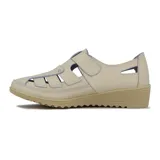 Guillermina casual de cuero sintético color beige, con suela alta y ajuste con velcro.
