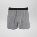 Pack de tres boxers de algodón en color blanco, negro y gris. Todos los boxers tienen cintura elástica negra con la marca "Underwear Collection" en blanco.