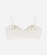Soutien strapless color blanco marfil con copas premoldeadas, confeccionado en poliamida texturizada sin costuras (seamless). Cuenta con breteles removibles y ajustables.
