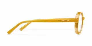Lentes con armazón redondo de policarbonato color amarillo y cristales transparentes con tecnología blueblocker y protección UV400.