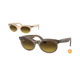 Lentes de sol Ray-Ban con montura de acetato color beige translúcido y lentes marrones degradadas.