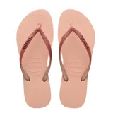 Sandalias tipo ojota Havaianas modelo Slim Glitter II, color beige arena. Presentan tiras finas con acabado de glitter brillante y logo de la marca en relieve.