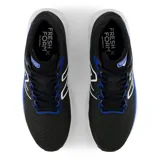 Championes de running New Balance Evoz V3, color negro con detalles en azul y blanco. Presentan entresuela Fresh Foam X para mayor amortiguación, capellada de malla transpirable sin costuras y suela de goma integrada.