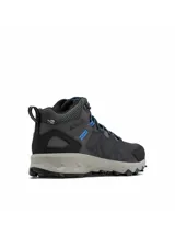 Botas de senderismo de media caña Columbia Peakfreak II Mid OutDry, color gris con detalles en azul y suela gris clara. Parte superior de malla sin costuras con membrana impermeable y transpirable, sistema de ajuste Navic Fit y suela con tecnología Adapt Trax para tracción en terrenos secos o mojados.