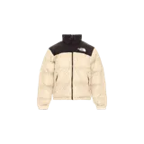 Campera puffer The North Face modelo 1996 Retro Nuptse 700 Fill Packable, de diseño bicolor en color beige claro y negro en la parte superior y cuello alto. Cuenta con cierre frontal completo y bolsillos laterales con cierre.