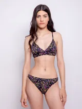 Bikini de lycra negro con estampado de flores multicolor.