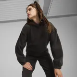 Buzo hoodie Puma ESS ELEV.Winter, color negro, de corte holgado y tejido de polar.