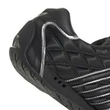 Championes adidas Adi Racer Low de diseño deportivo, color negro con textura acolchada en forma de rombos. Presenta las tres tiras características de la marca en color plateado y detalles metálicos en el talón y la suela.